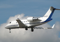Jet landing at Opa Locka airport near the hotel